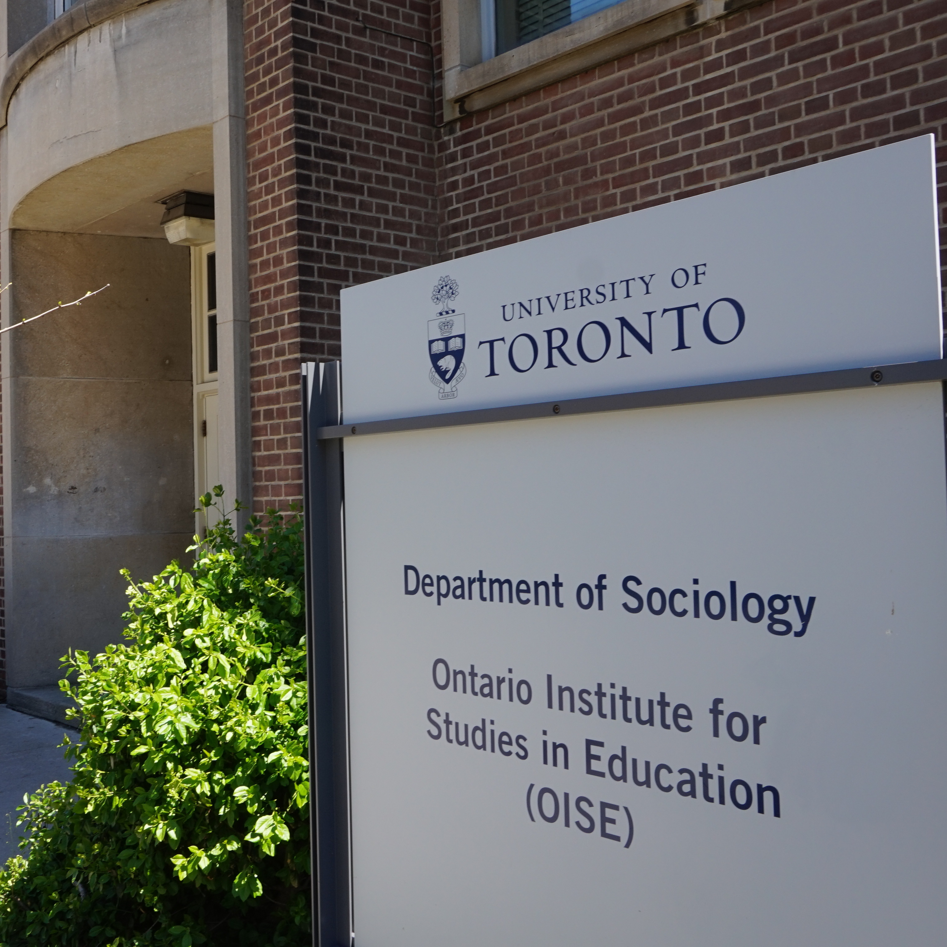 Building sign for the Department of Sociology and OISE at the University of Toronto
