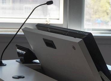 Podium with computer screen and microphone